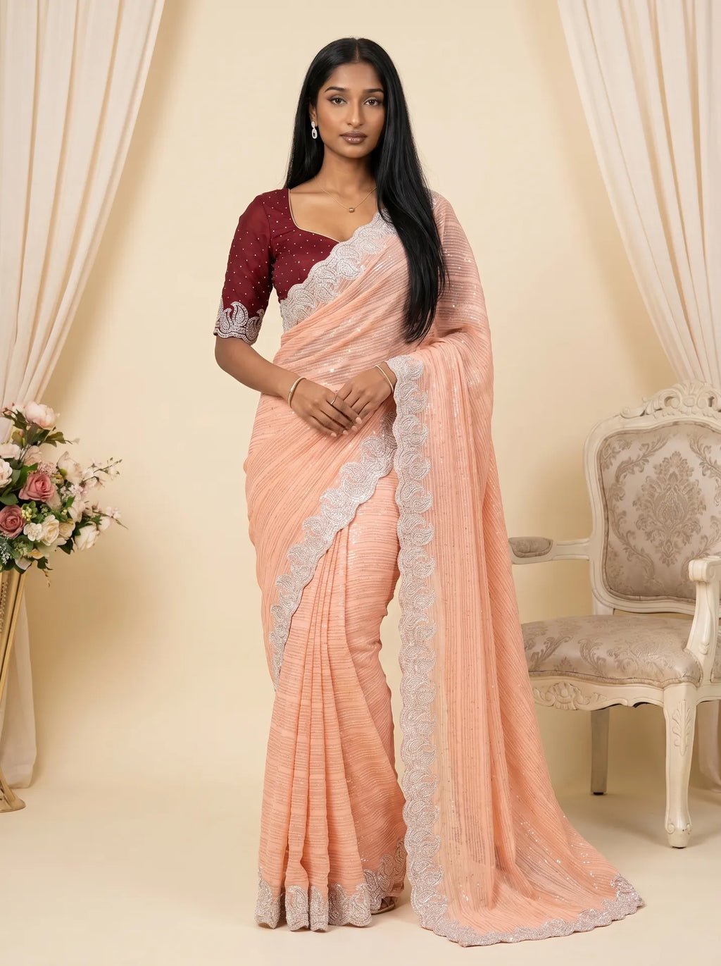 Pastel Peach Embellished Paisley Border Saree with Contrast Maroon Blouse